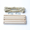 All the pieces to assemble a 5 rung Rope Ladder, showing the 2 pieces of 4 metre rope and clips to hang it. Sturdy Outdoor Wooden Toy | Conscious Craft
